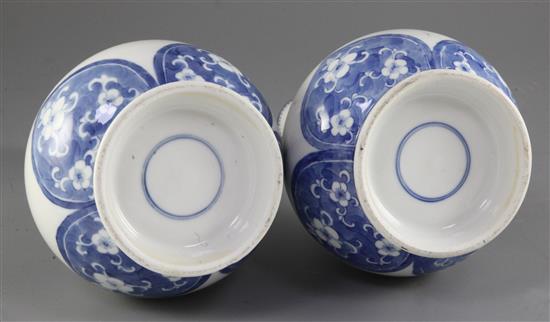 A pair of Chinese blue and white bottle vases, late 19th century, 28cm, one neck broken and glued